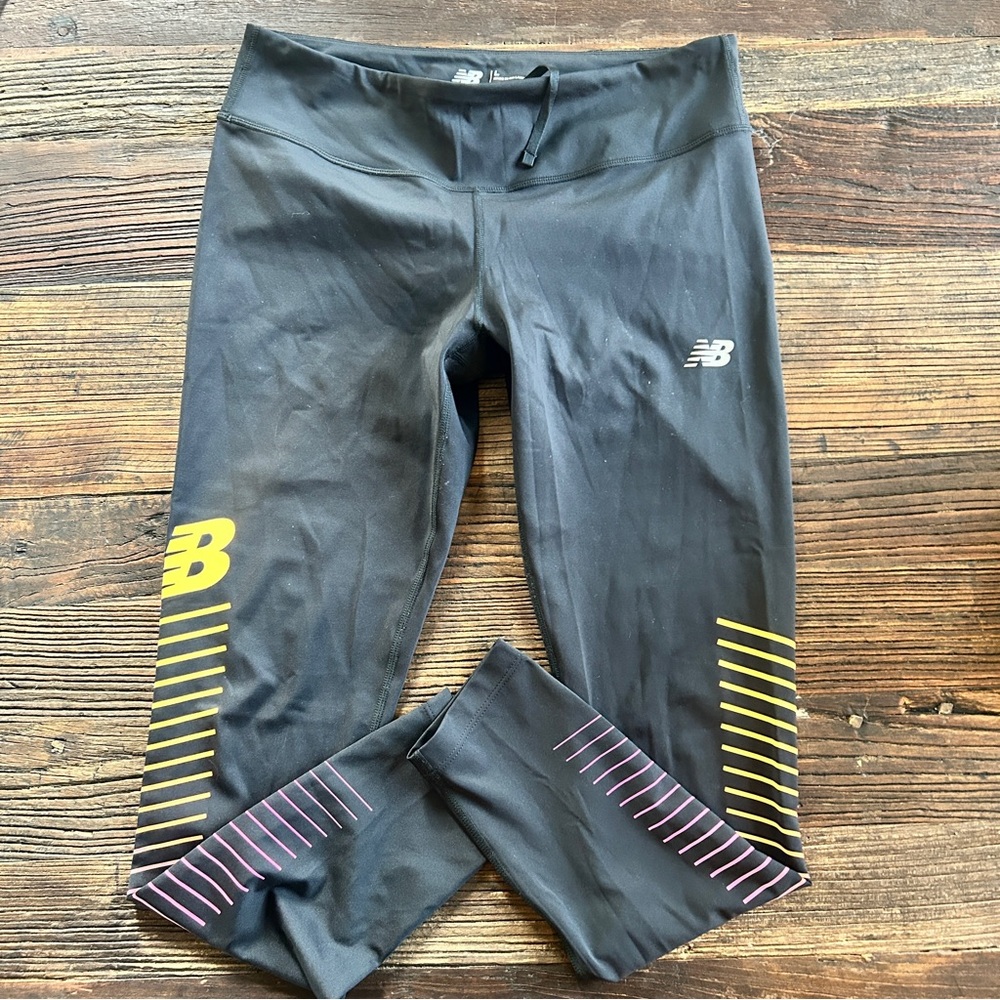 New Balance | Reflective Accelerate Black Leggings with Yellow and Pink Accents